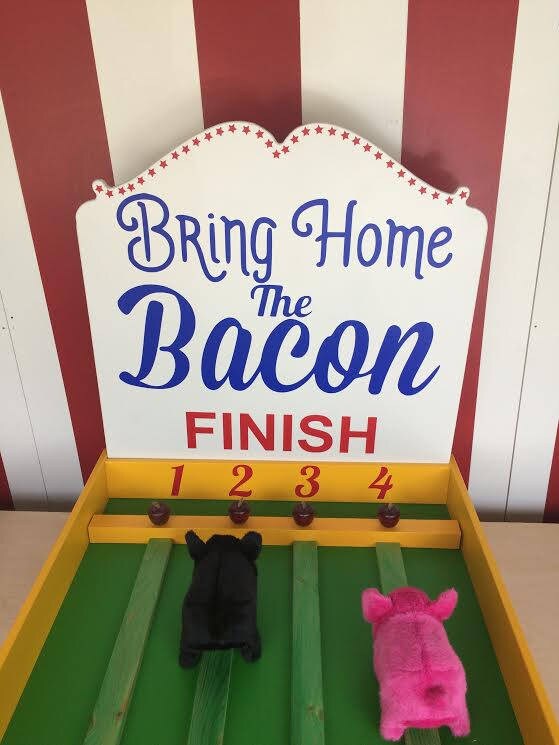 Pig racing carnival games